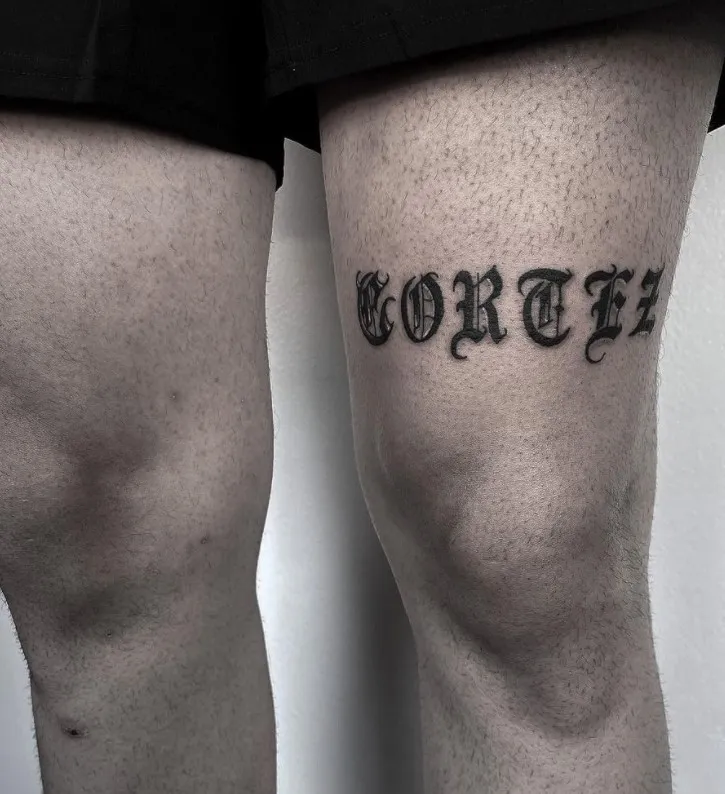 above knee tattoo men