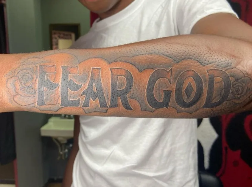 fear god tattoo idea on arm
