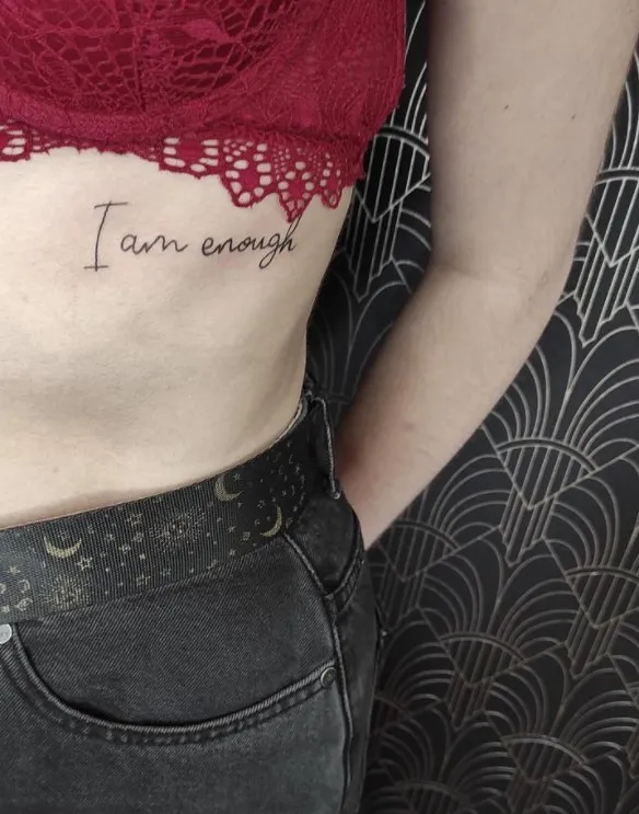 i am enough tattoo on rib