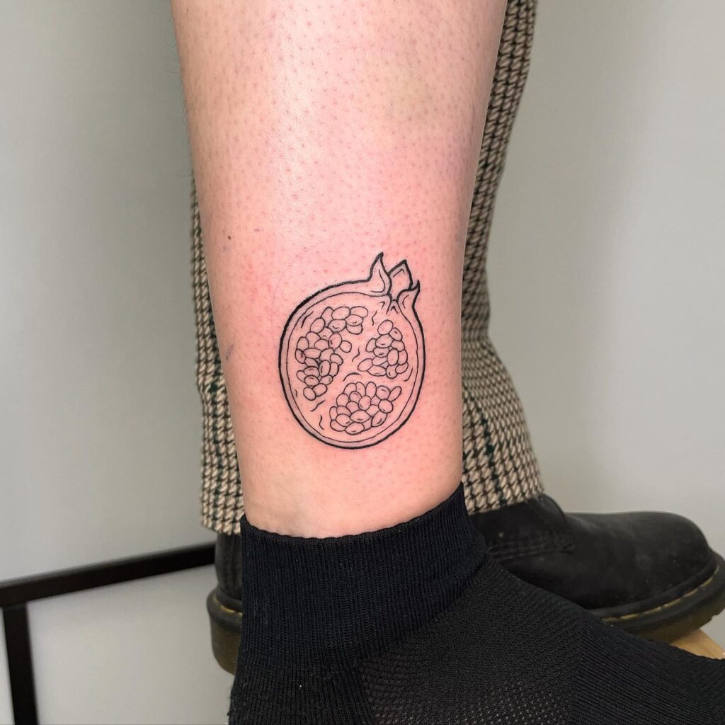 Pomegranate tattoo on ankle