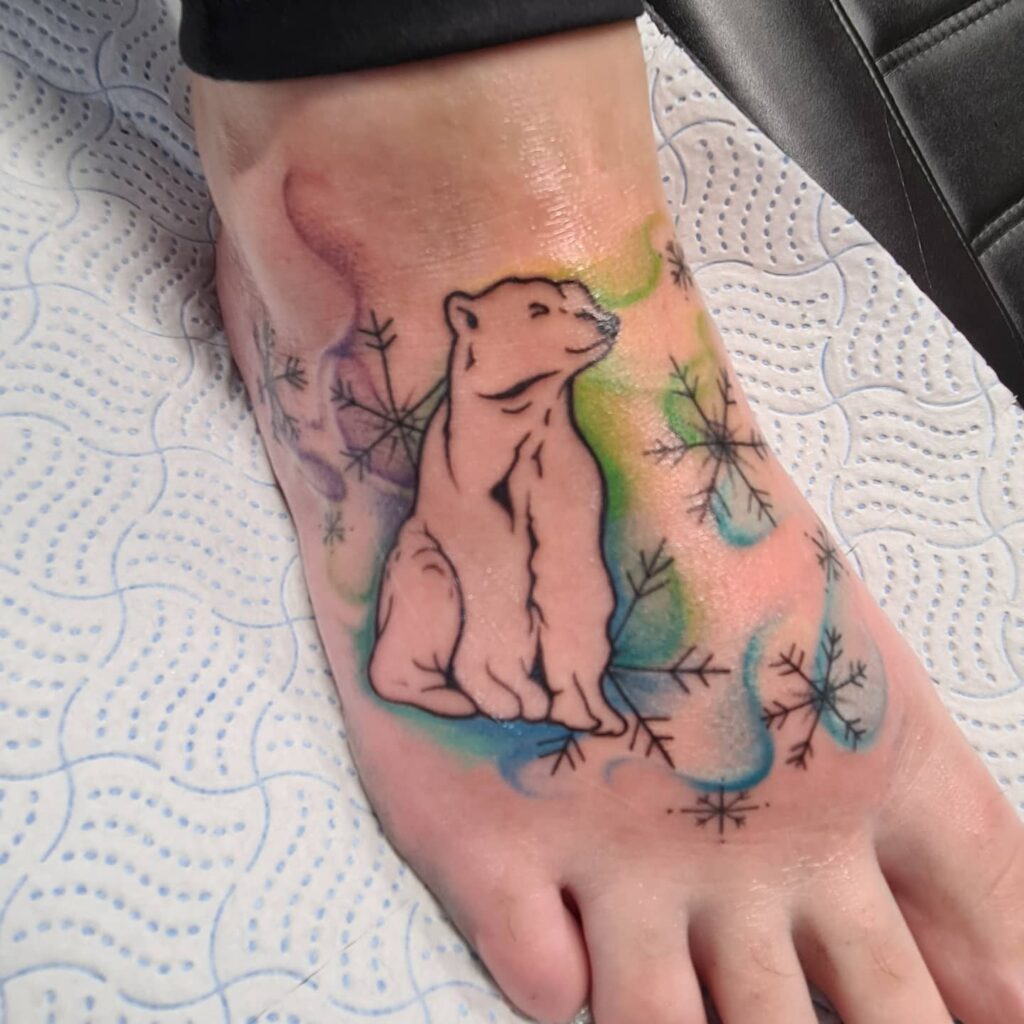 polar bear tattoo with flower