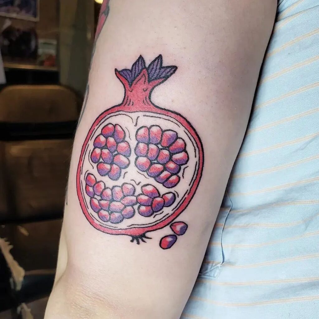 half Pomegranate tattoo 