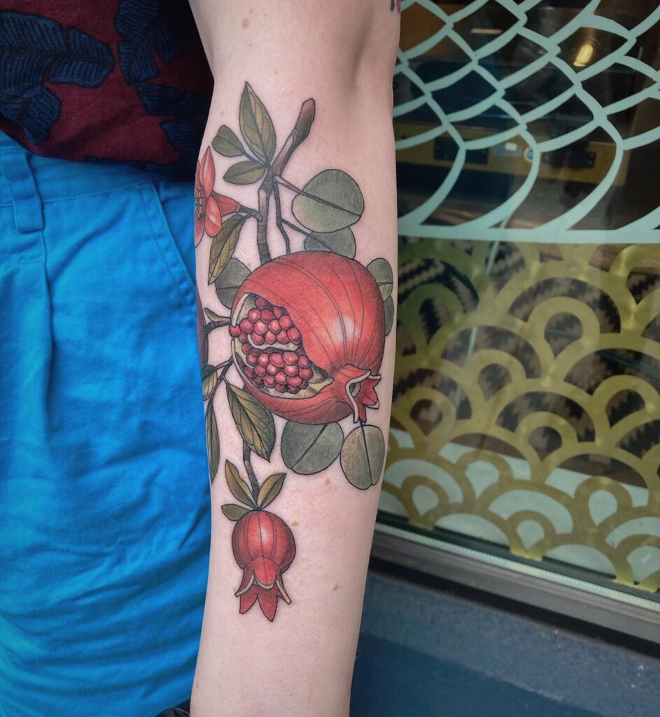 half sleeve colorful Pomegranate tattoo