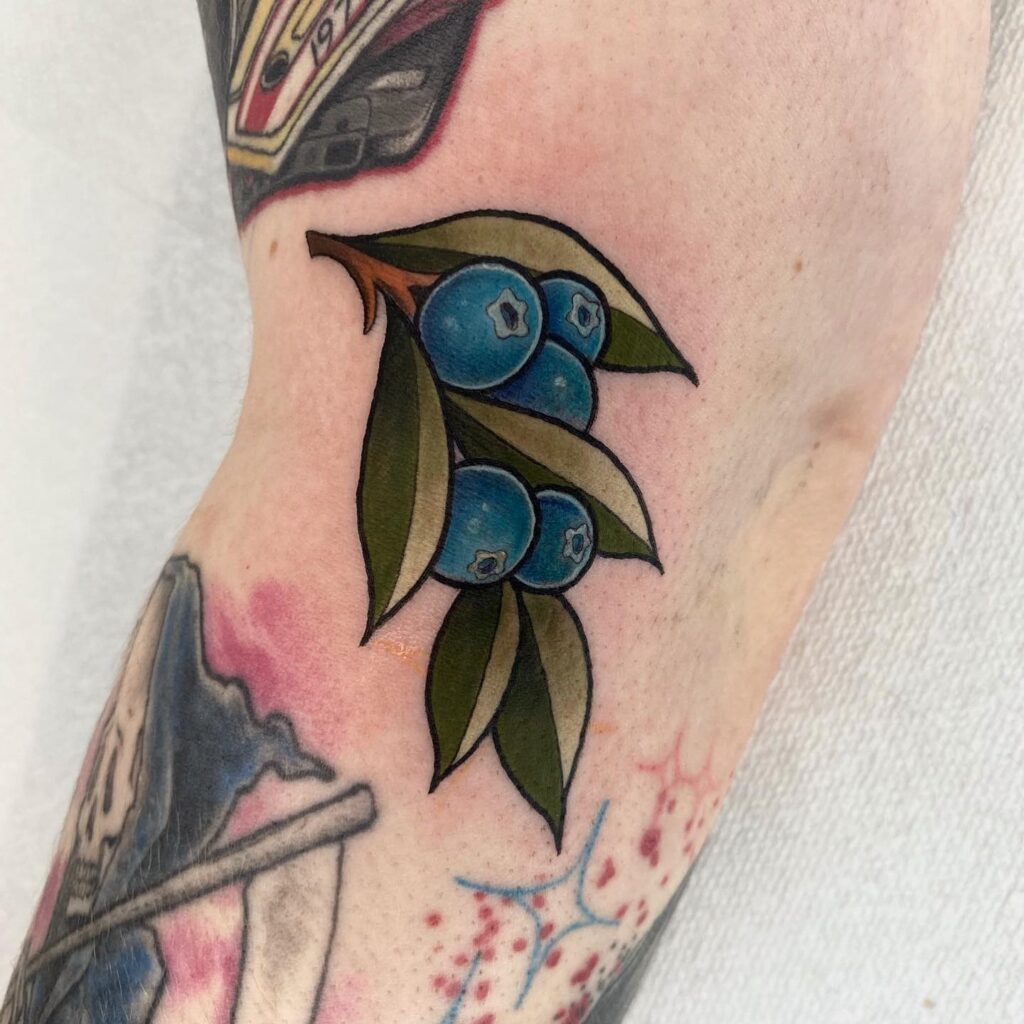 minimalistic blueberry tattoo