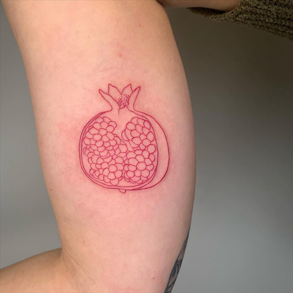 red inked Pomegranate tattoo