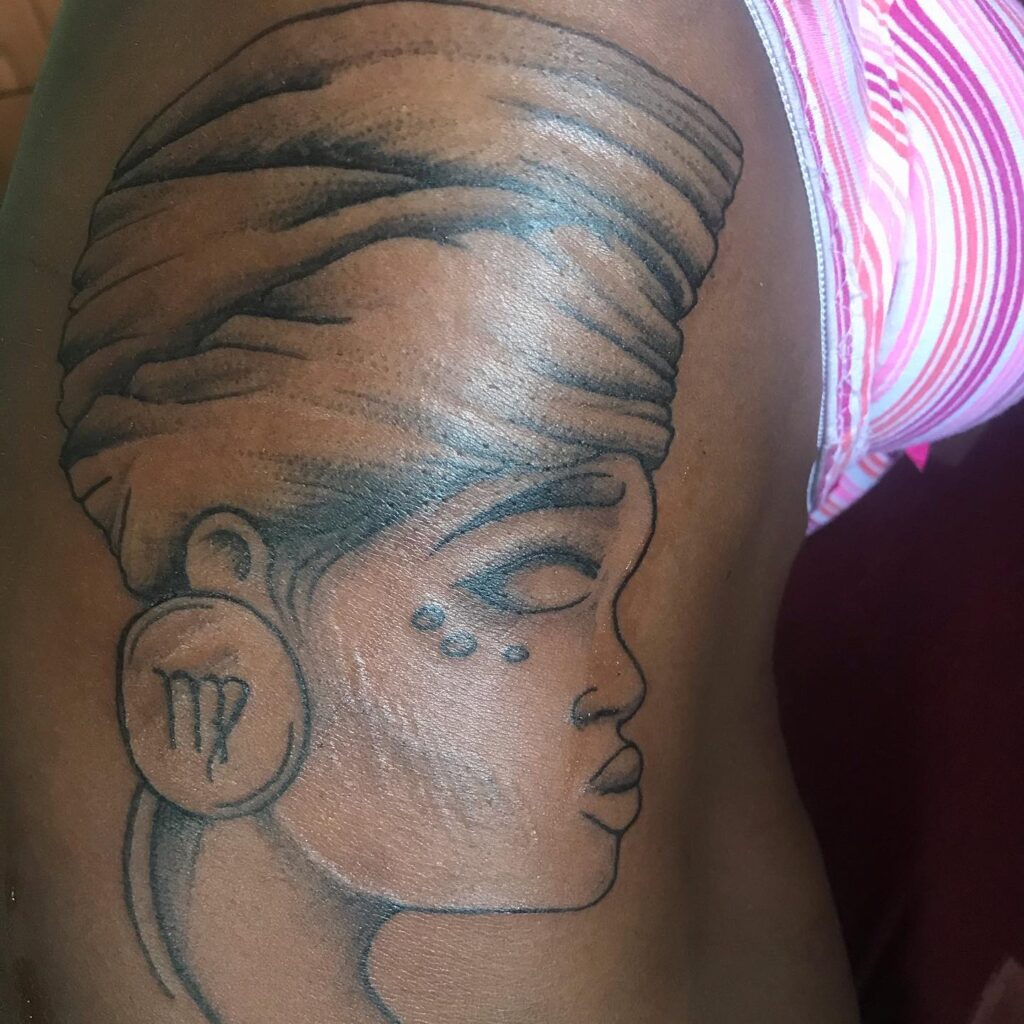 Black Queen Tattoo on Black Skin