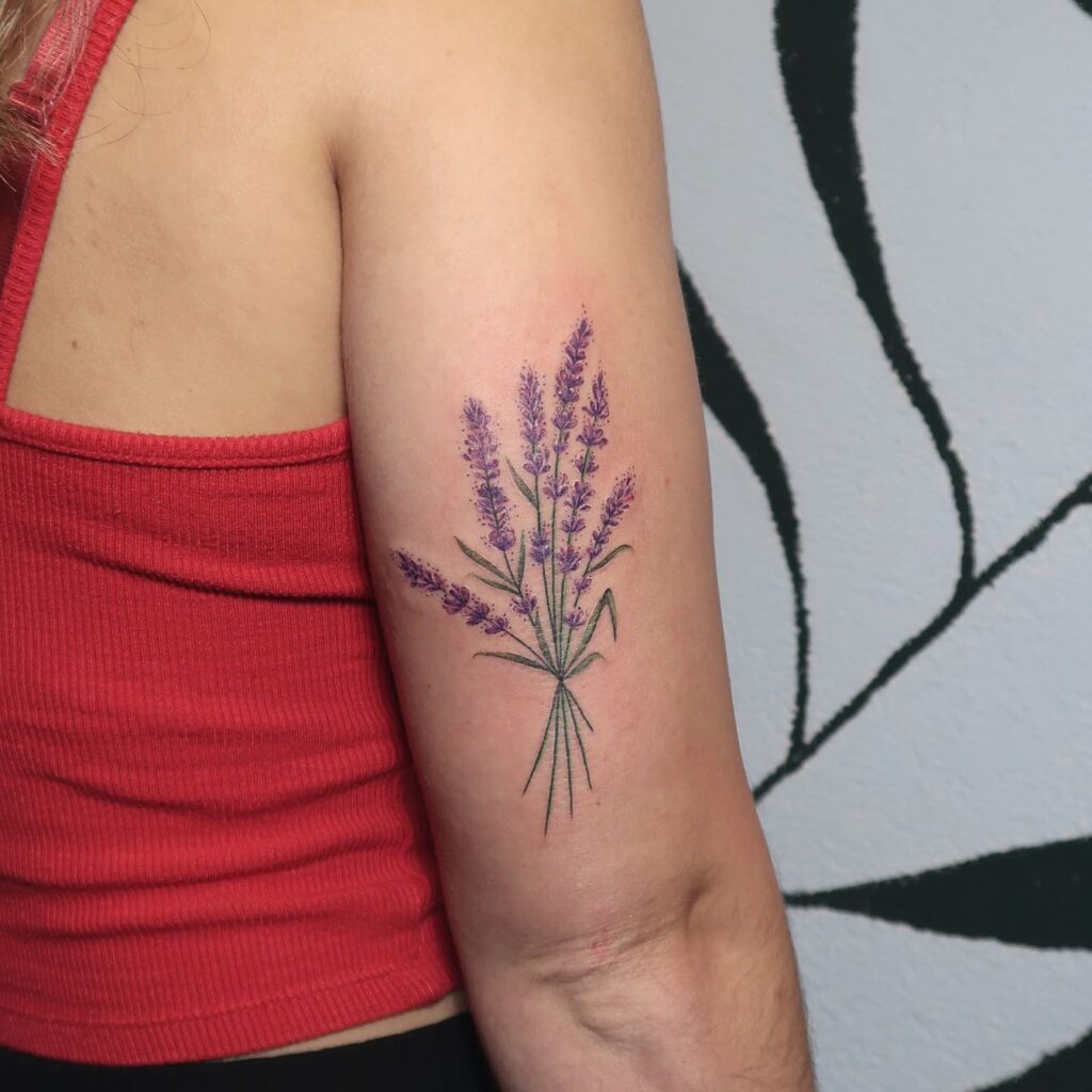 Colorful Lavender Tattoo on the Outer Arm