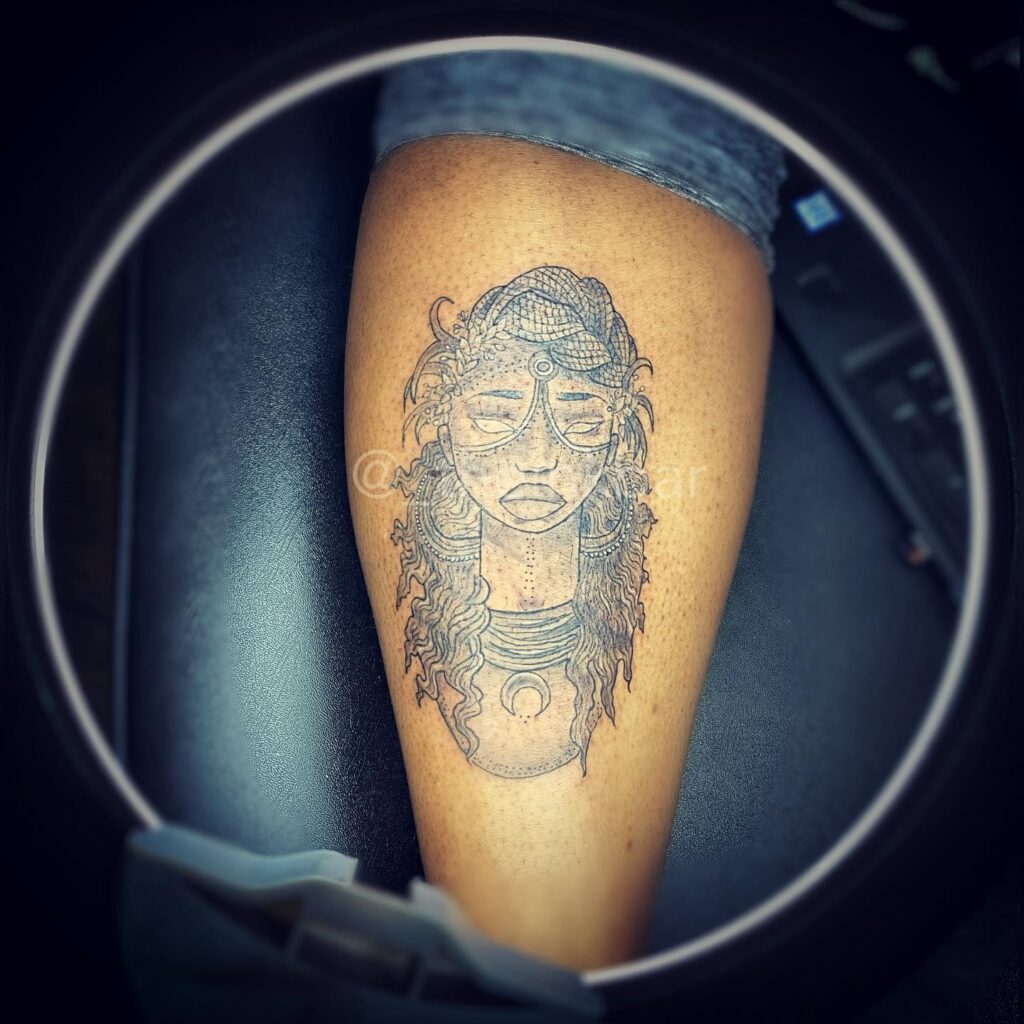 Complex African Queen Tattoo with Fine Lines