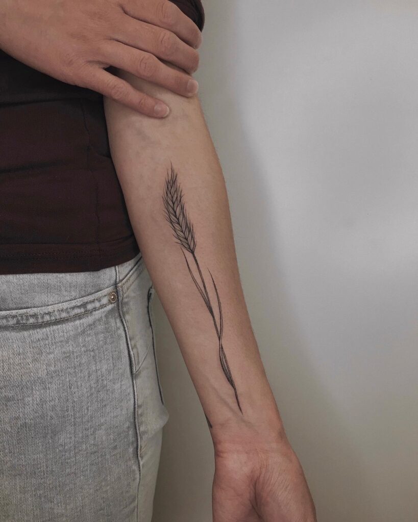 Long Wheat Tattoo on the Arm