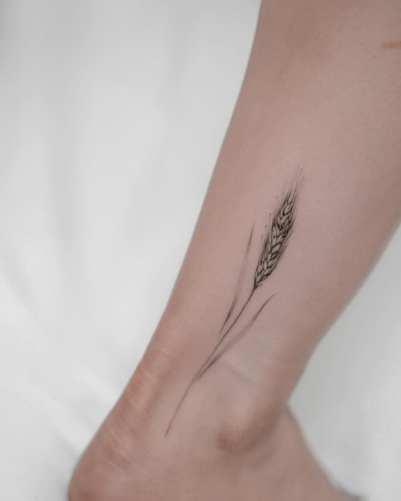 Minimalistic Wheat Tattoo on the Ankle