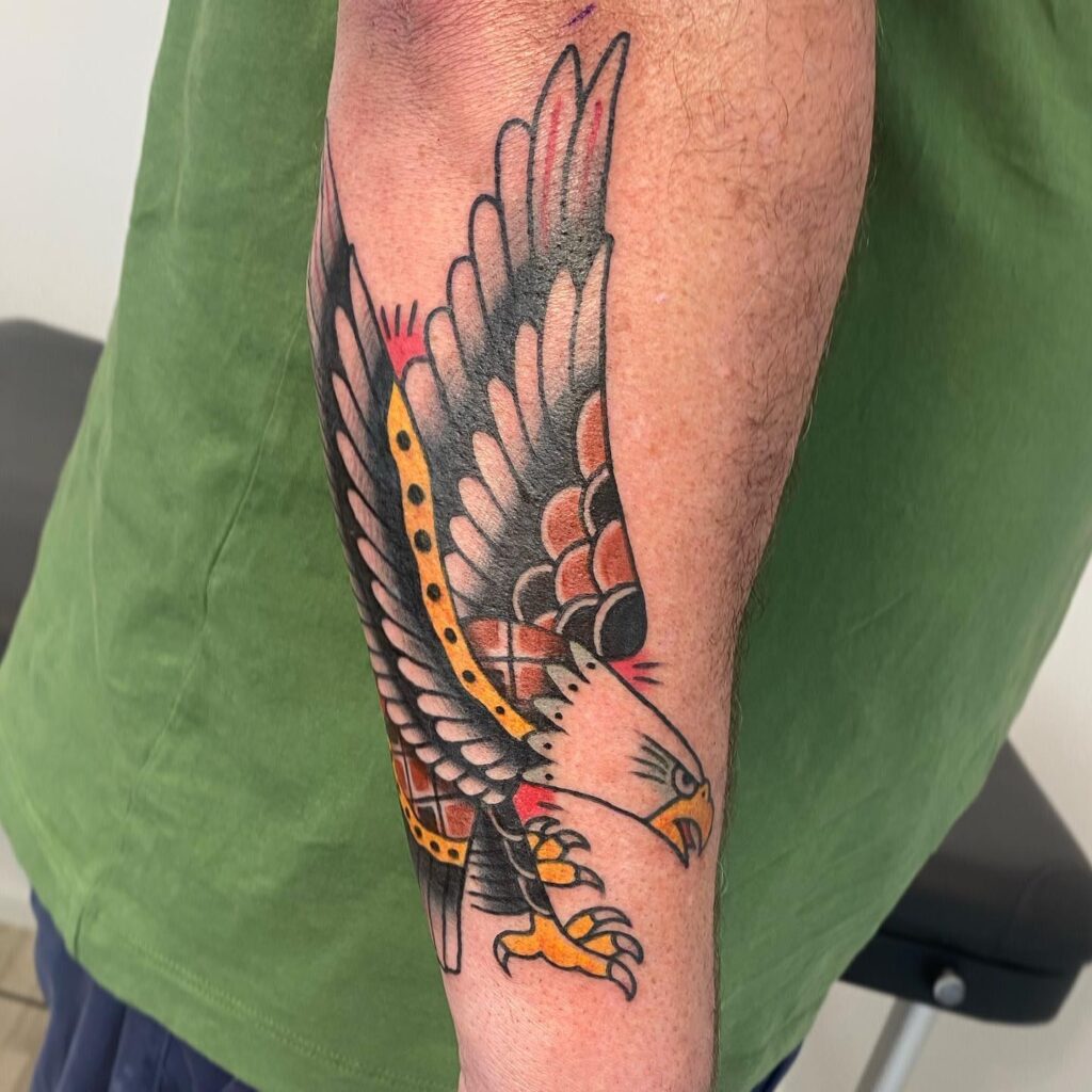 Yellow red and black Eagle Tattoo