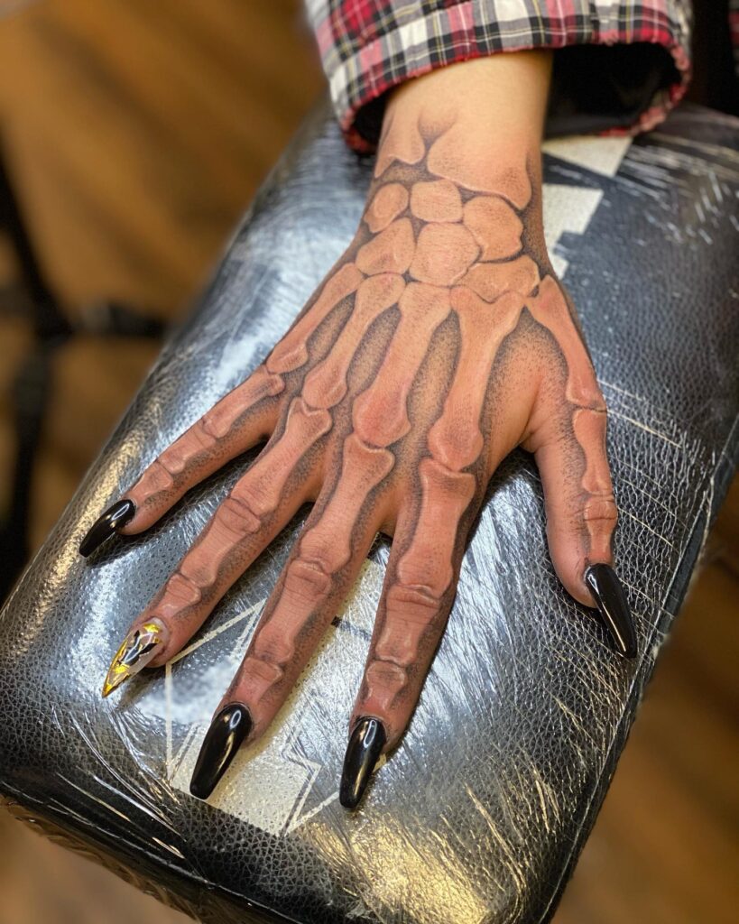 skeleton hand tatoo for girls