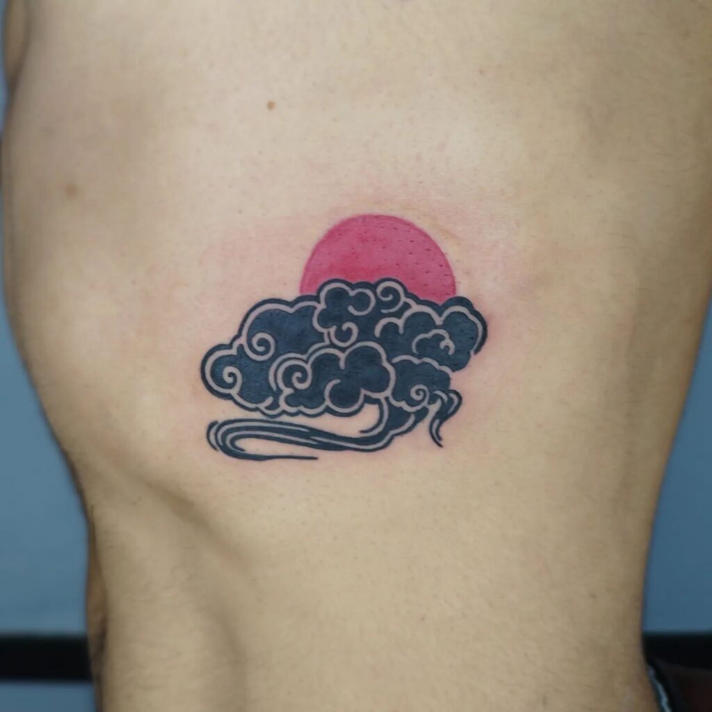 Cloud Tattoo with Black and Red ink