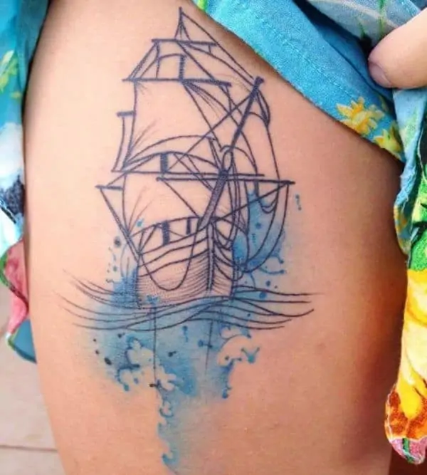 blue drawing ship tattoo