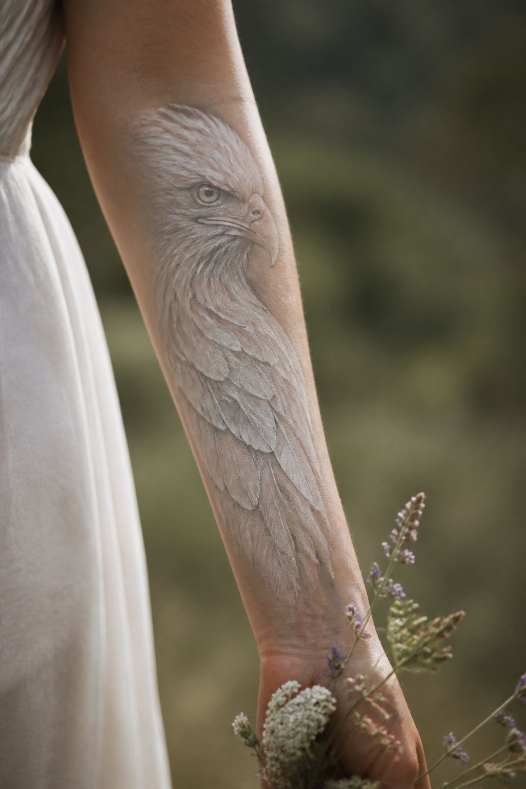 Eagle Tattoo Ideas for Men and Women: Designs and Styles 21 White eagle tattoo featuring pale feathers.
