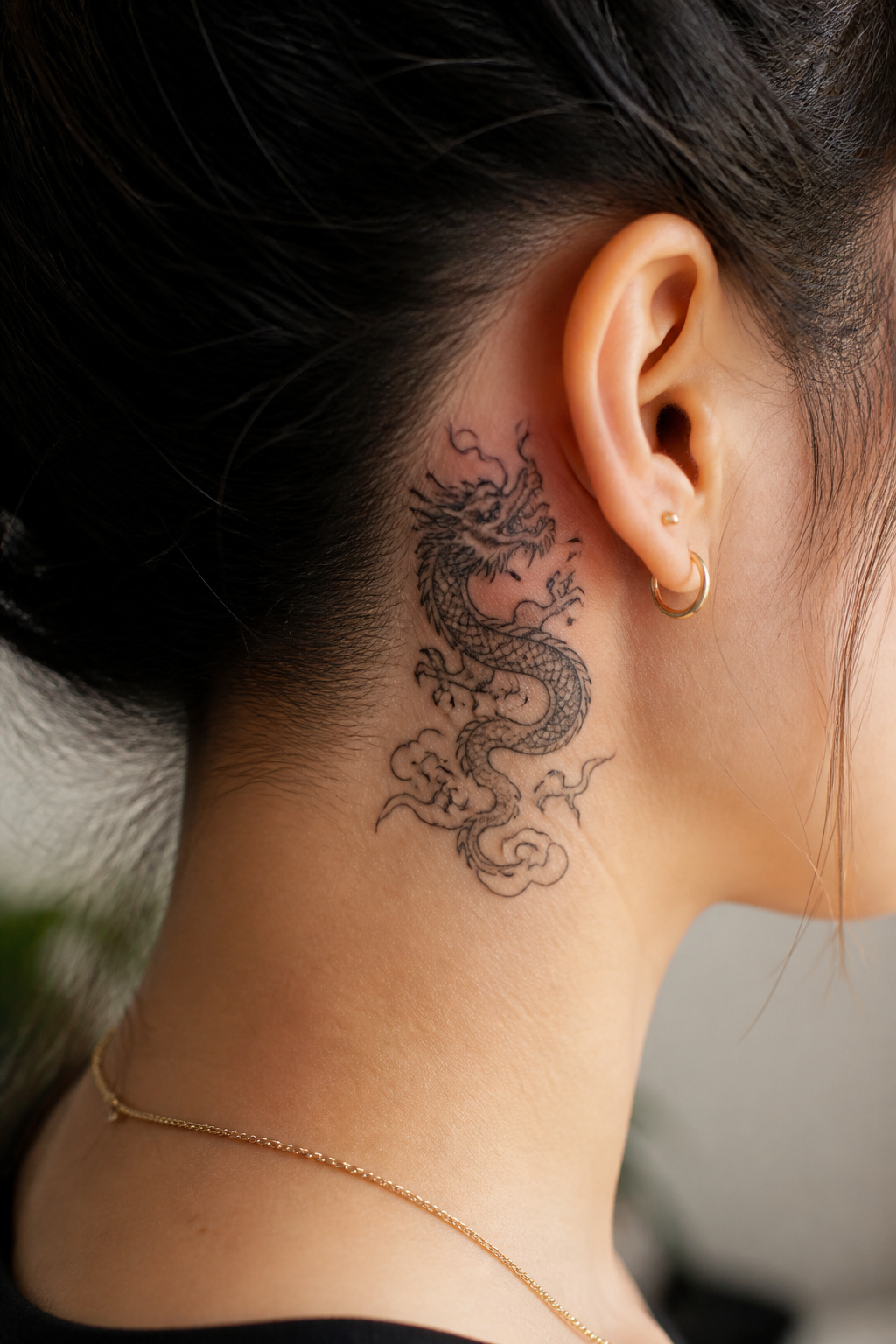5 Dragon Tattoo Behind Ear Ideas: Styles for 2026 3 Asian-style dragon tattoo behind the ear with flowing silhouette.
