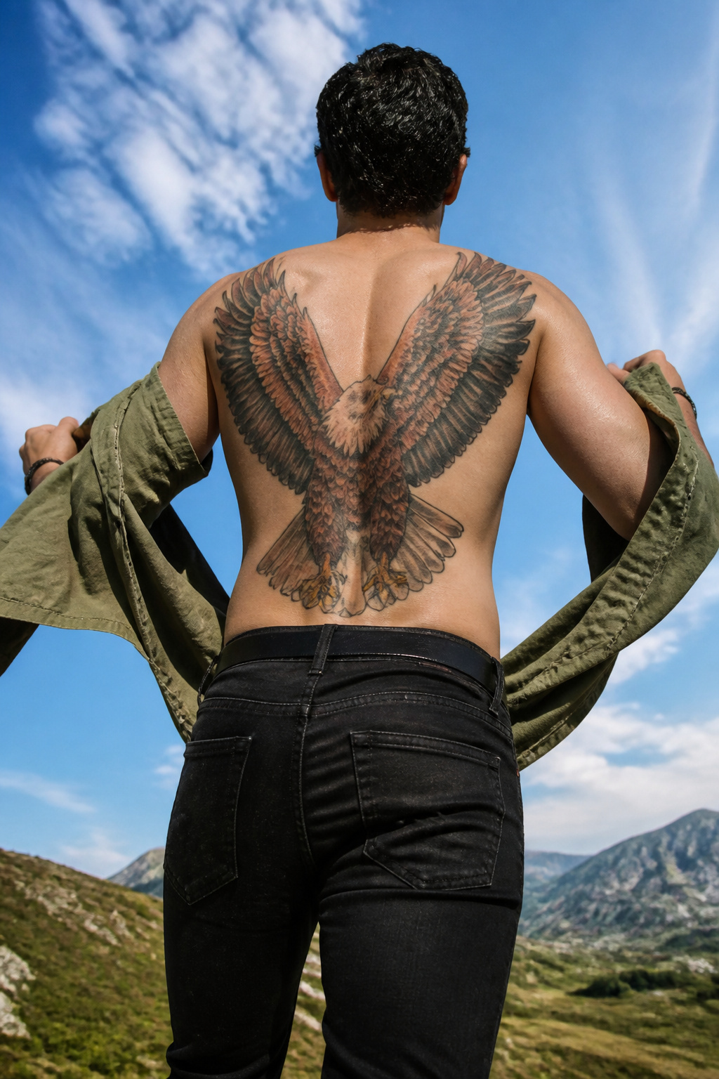Eagle Tattoo Ideas for Men and Women: Designs and Styles 4 Flying eagle tattoo showcasing wingspan on chest.