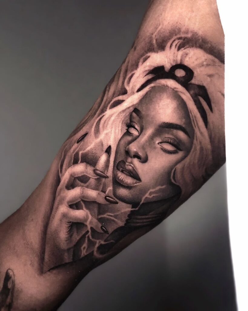 A black and grey realism tattoo of a woman's face with lightning bolts on an arm.
